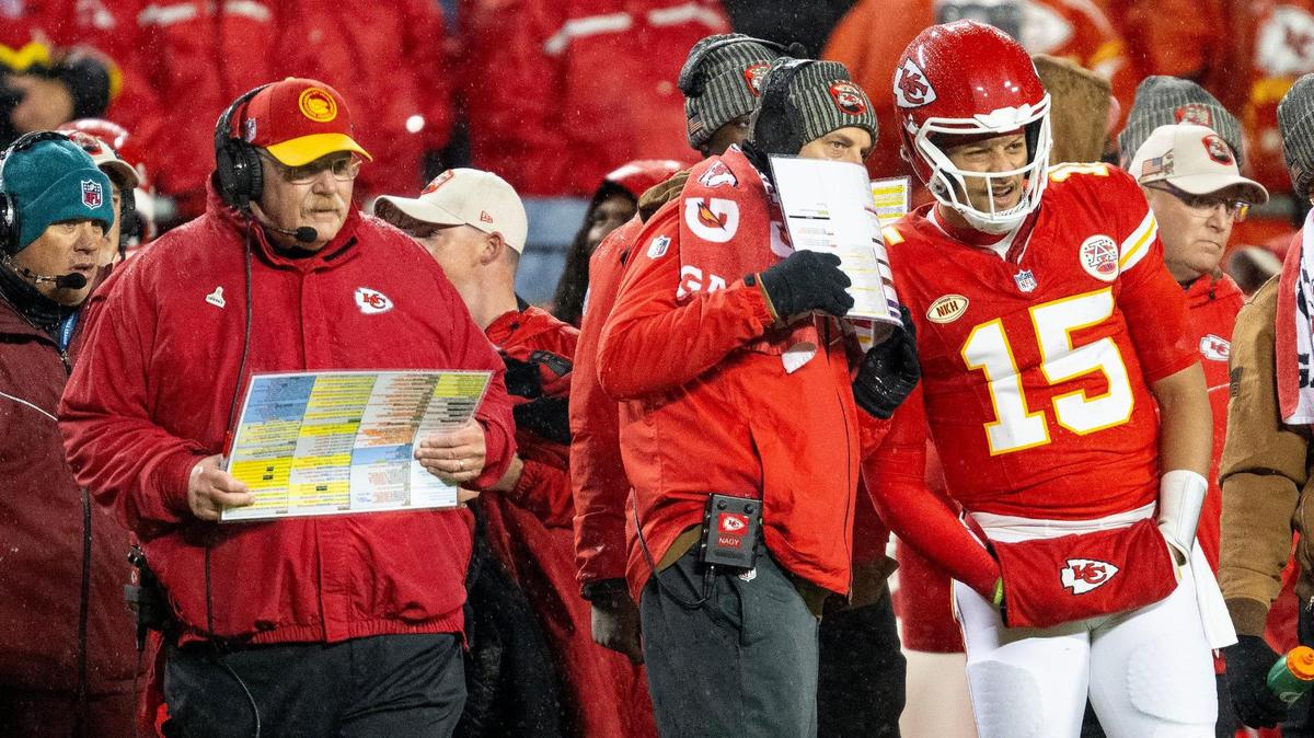 Chiefs quarterback Patrick Mahomes (No. 15) listens to offensive coordinator Matt Nagy while head coach Andy Reid, left, looks on during Monday night’s game against the Philadelphia Eagles at GEHA Field at Arrowhead Stadium.