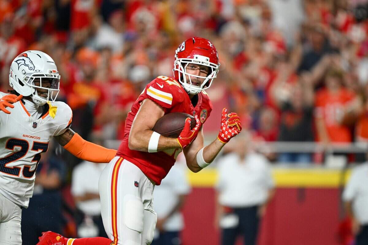 Kansas City Chiefs tight end Travis Kelce (87) runs the ball down field in the second half of the Kansas City Chiefs vs. Denver Broncos NFL season opener at Arrowhead Stadium in Kansas City on Sept. 14, 2026.