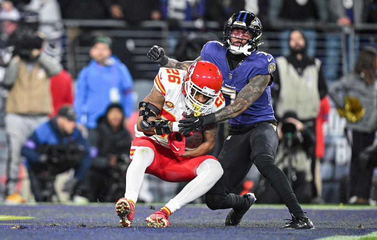 Kansas City Chiefs safety Deon Bush (26) intercepts a pass in the Ravens’ end zone intended for Baltimore Ravens wide receiver Rashod Bateman (7) in the fourth quarter Sunday, Jan. 28, 2024, during the AFC Championship Game in Baltimore.
