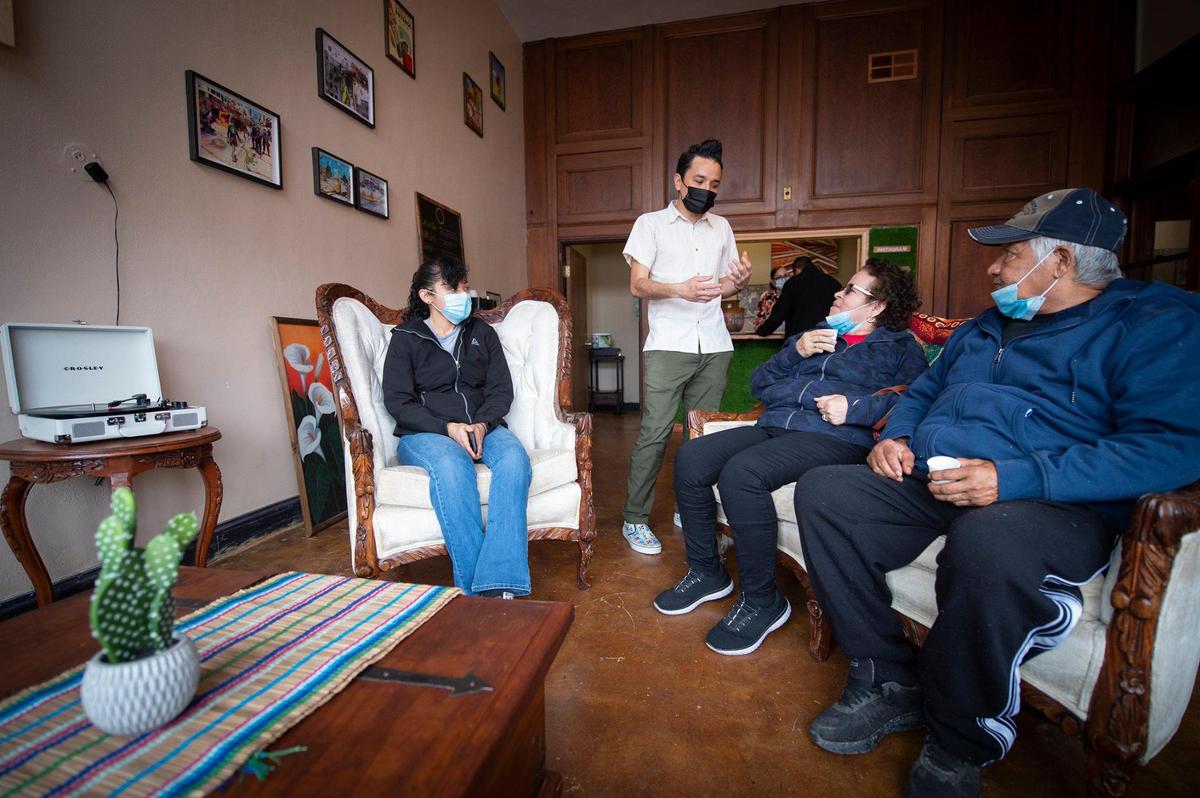 Francisco Murguia talked with Jessica Sanchez, from left, Marie and Martin Sanchez of Kansas City, Kansas, after the family stopped into Cafe Ollama.