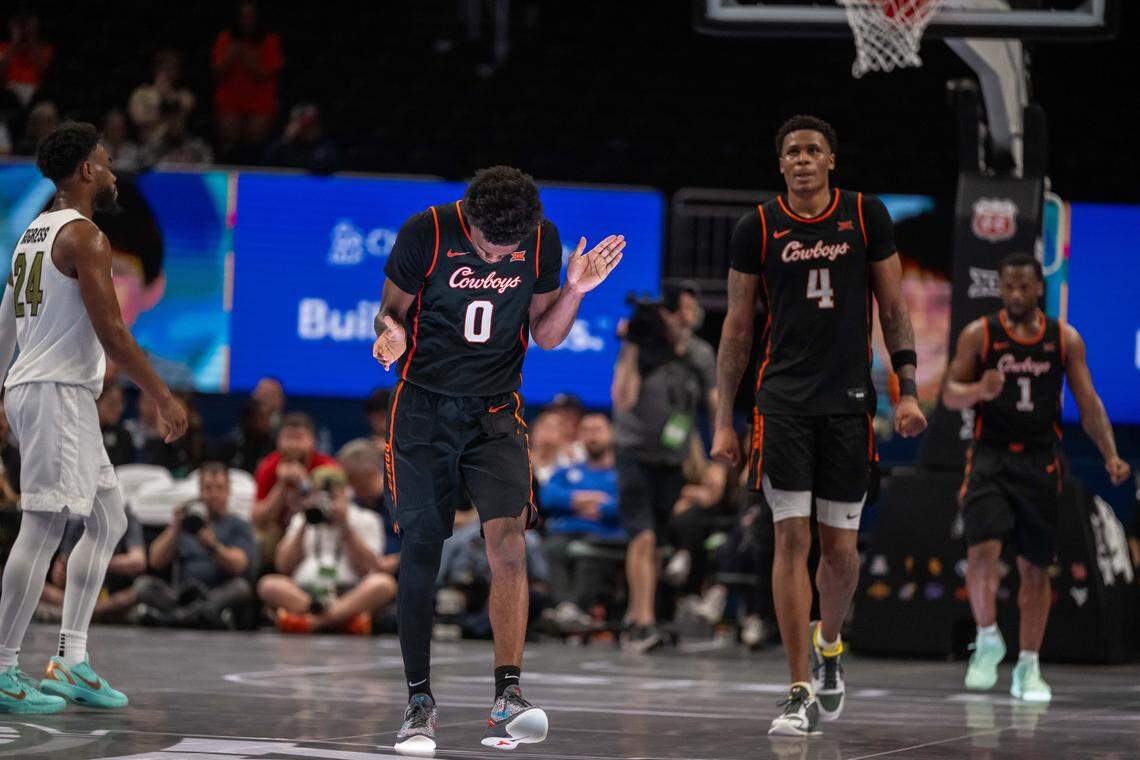 Oklahoma State Cowboys guard Jaylen Curry (0) claps at half court as the Cowboys take the lead late in the second half of the Colorado Buffaloes first round game vs. the Oklahoma State Cowboys in the Big 12 Men's Basketball Tournament, on Tuesday, March 10, 2026, at T-Mobile Center.