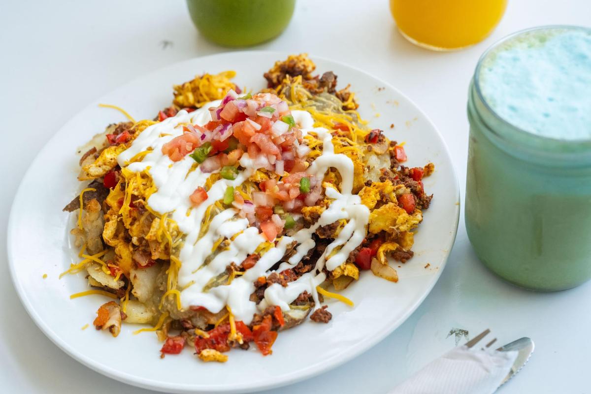 The Southwest Sink skillet is served at Succotash. It features eggs with chorizo, peppers and onions and is served on home fries, covered in cheese, homemade salsa verde and sour cream.
