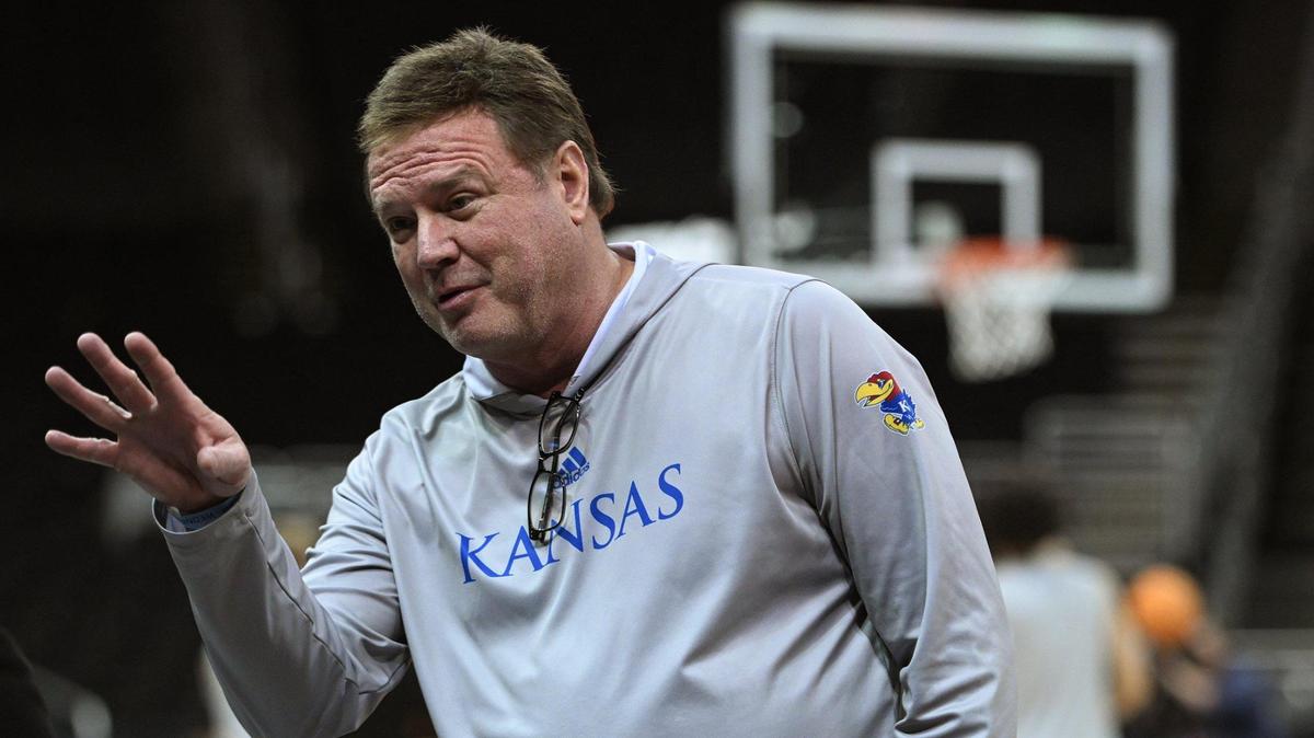 Kansas coach Bill Self talks with a reporter while the Jayhawks took to the court for practice Wednesday afternoon in preparation for the Men’s Big 12 Conference Tournament that tips off Wednesday evening when West Virginia takes on Texas Tech.