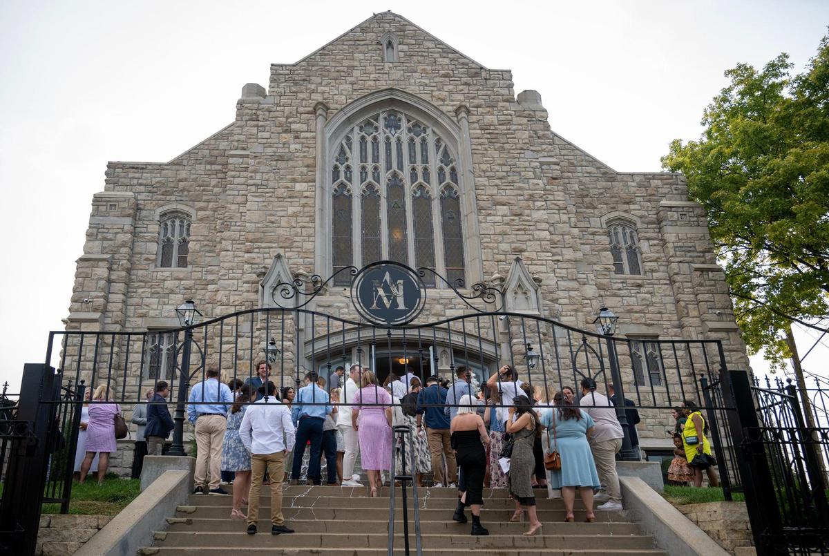 Family and friends gather for the grand opening of Melrose Abbey, a $3 million luxury wedding and event space created from the 102-year-old Broadway Baptist Church on Broadway Boulevard and 39th Terrace.