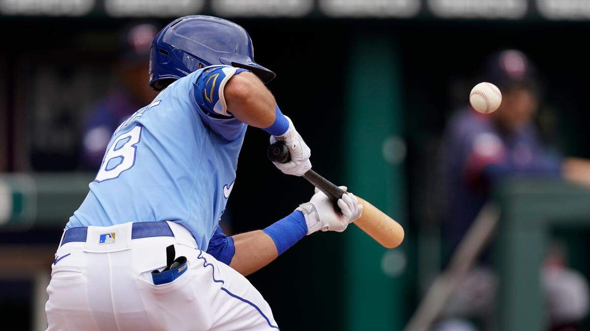 Kansas City Royals’ Nicky Lopez bunts into a triple play during the third inning of a baseball game against the Minnesota Twins Sunday, June 6, 2021, in Kansas City, Mo. (AP Photo/Charlie Riedel)