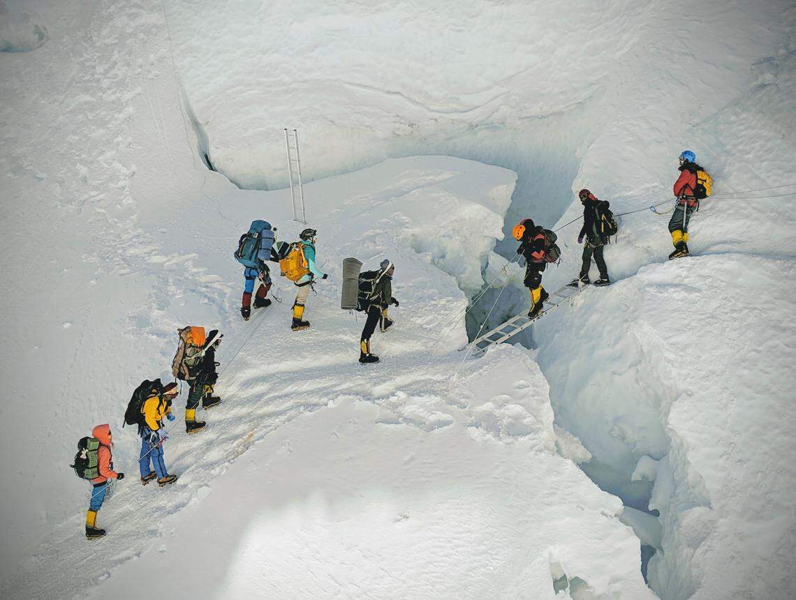 It’s a bit of a human traffic jam as climbers cross ladders in the Khumbu Icefall.