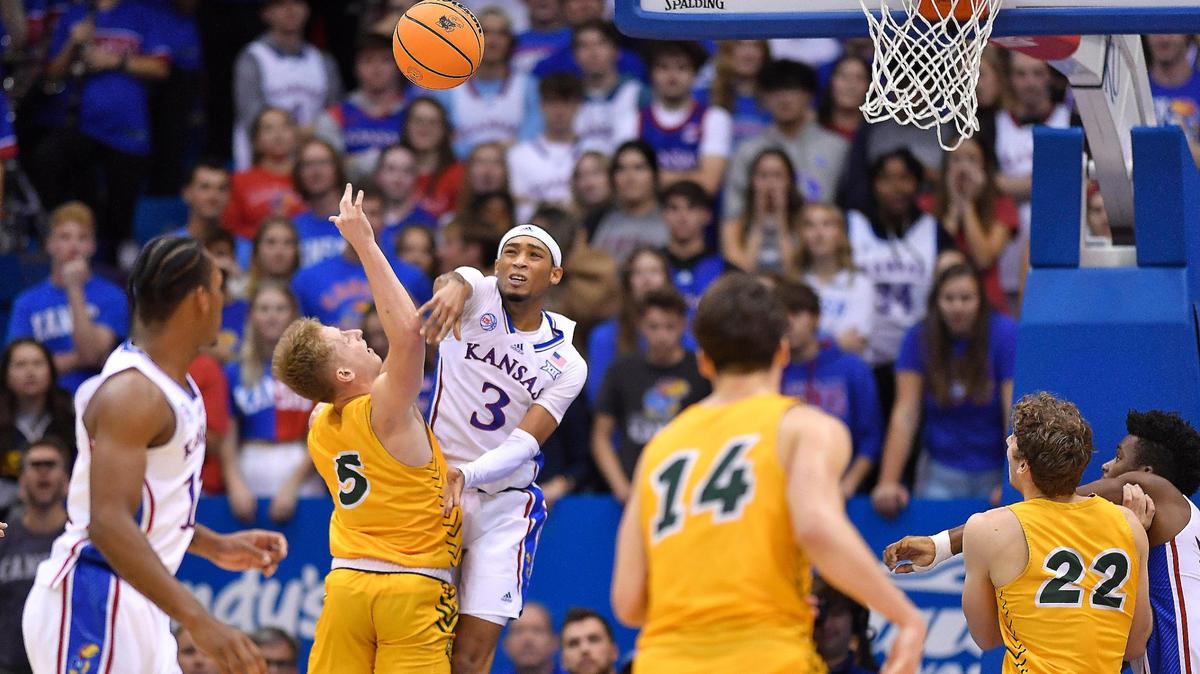 KU’s Dajuan Harris blocks a shot by NDSU’s Luke Yoder during the second half of Thursday night’s game at Allen Fieldhouse. KU beat North Dakota State 82-59.