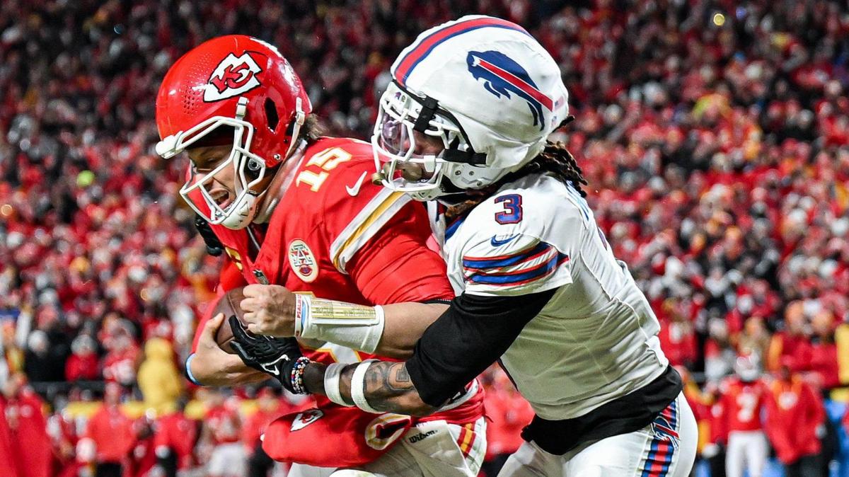 Kansas City Chiefs quarterback Patrick Mahomes (15) battles Buffalo Bills safety Damar Hamlin (3) to get into the end zone for a touchdown in the second quarter during the AFC Championship Game on Sunday, Jan. 26, 2025, at GEHA Field at Arrowhead Stadium.