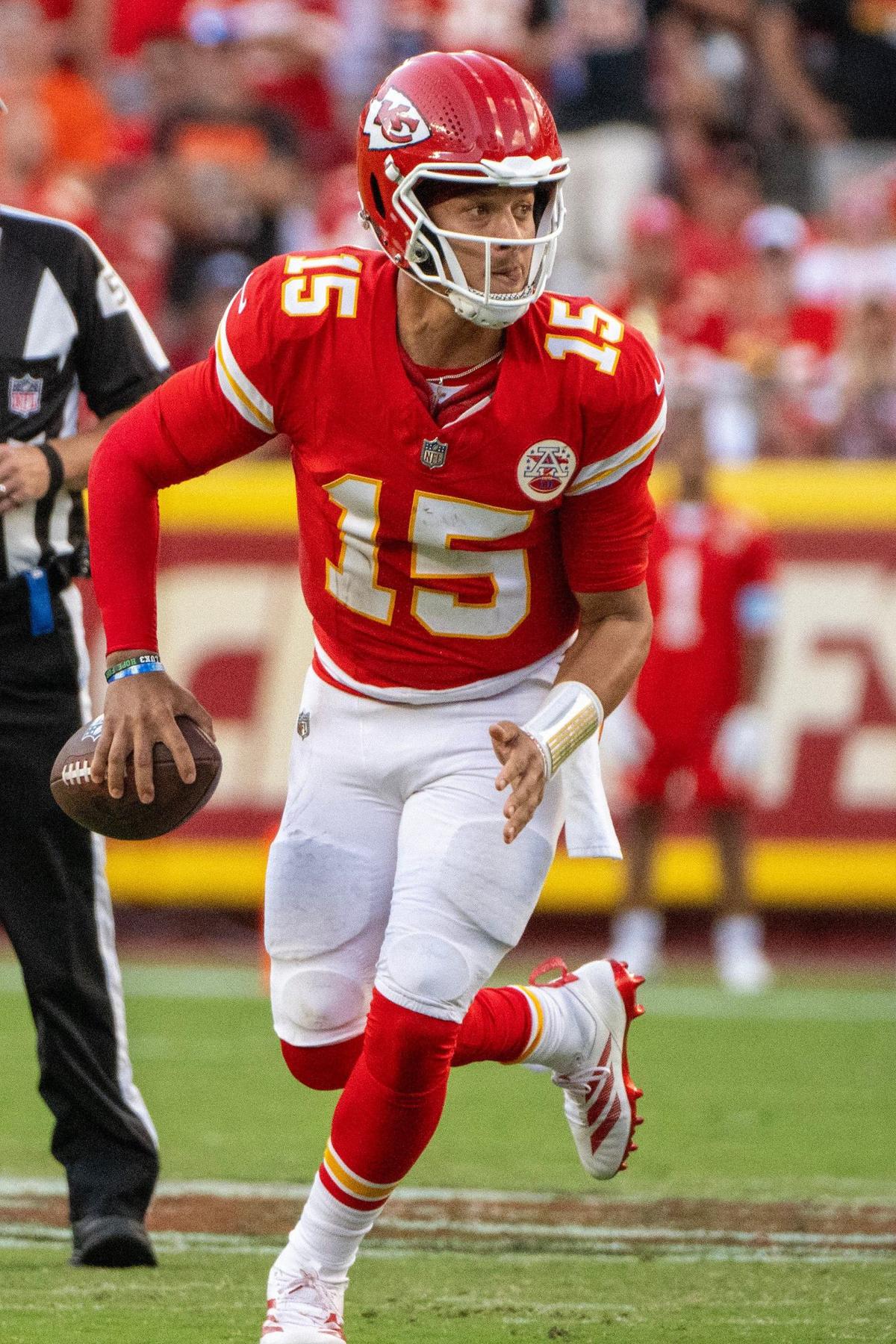 Kansas City Chiefs quarterback Patrick Mahomes (15) rushes for yardage in the second quarter during an NFL game against the Cincinnati Bengals on Sunday, Sept. 15, 2024, at GEHA Field at Arrowhead Stadium.