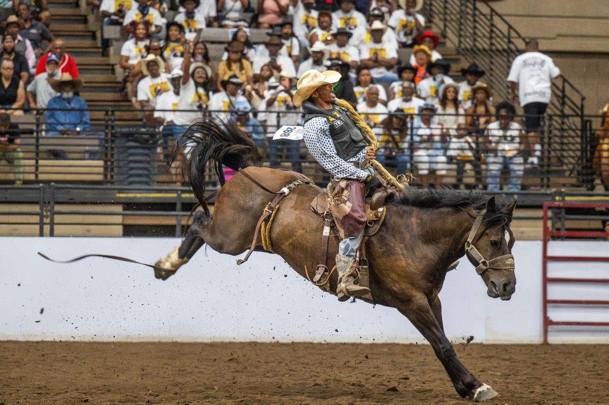 Lamarr Hankins shows off his bronc riding skills during the Black Rodeo USA show at Hale Arena in Kansas City on Saturday, July 26, 2025.