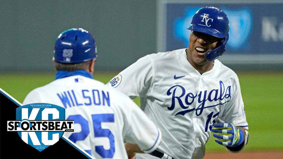 The Kansas City Royals’ Salvador Perez and third base coach Vance Wilson