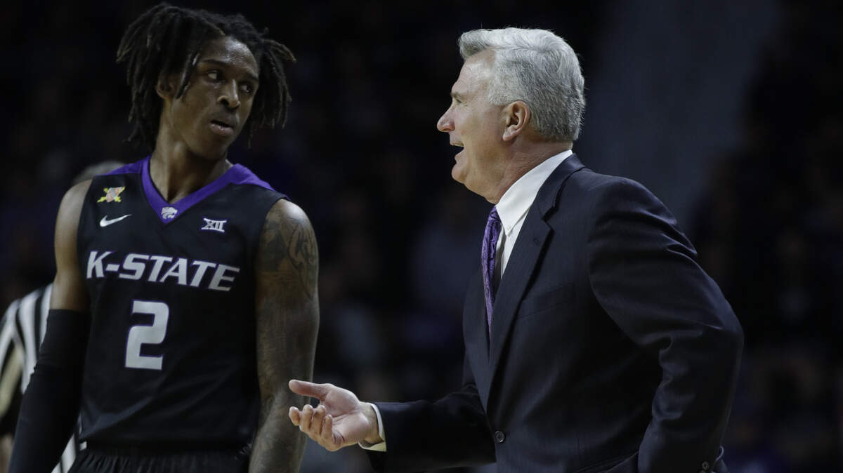 Wildcats coach Bruce Weber, right, hopes healthy Kansas State players like guard Cartier Diarra will rise to the occasion Friday night, and hopefully Sunday, in Charlotte.