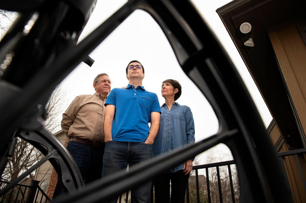 Will Schuller (center) no longer needs this wheelchair because of a new, experimental drug. His parents, Bob and Ann Schuller, are fighting the drug’s imminent price increase of $375,000 a year.