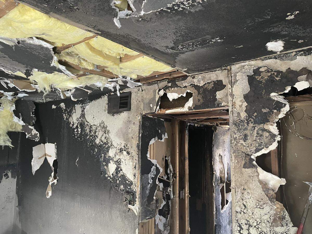 A female resident escaped a heavy apartment blaze Tuesday morning.
