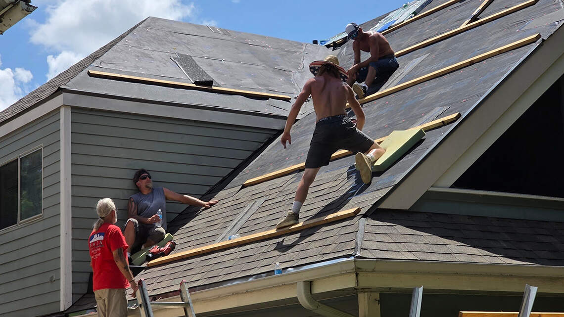 The men on the roof at 92 degrees in Lawrence, Kansas | Opinion