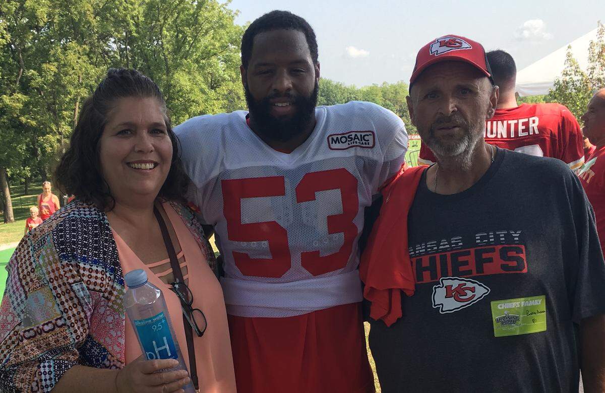 From left to right, Amy Anderson, Anthony Hitchens and Brad Anderson during Chiefs training camp in St. Joseph.