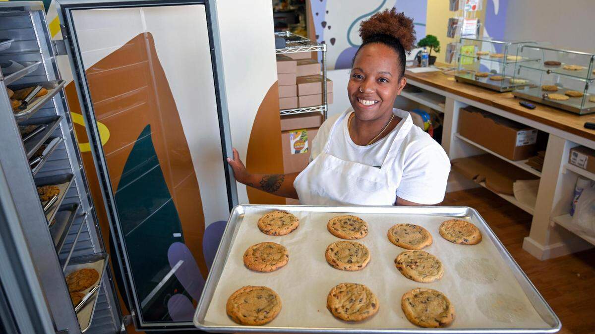 Asia Lockett, one of three owners of Brown Suga, was busy filling orders in the cookie shop at 1066 W. Santa Fe St., Olathe.