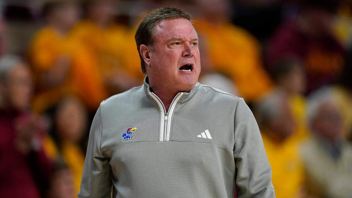 Kansas head coach Bill Self watches from the bench during the first half of a game against Iowa State, Saturday, Feb. 4, 2023, in Ames, Iowa.