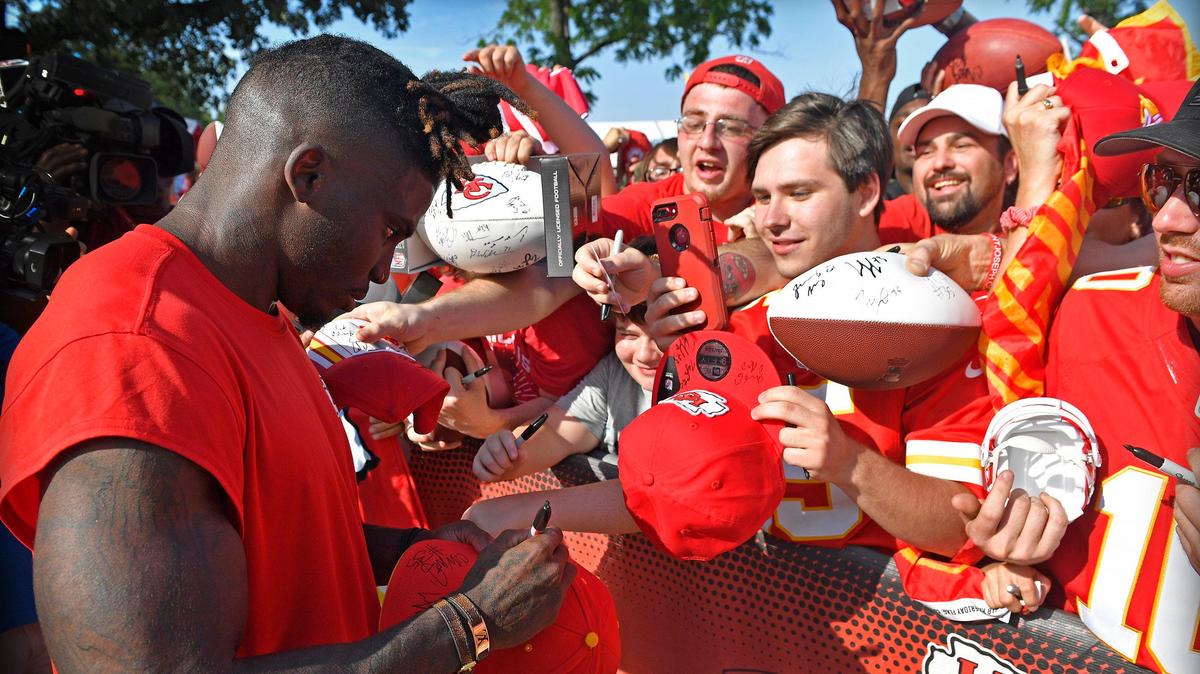 Chiefs’ Tyreek Hill signed autographs on at camp on Saturday in St. Joseph, Mo.