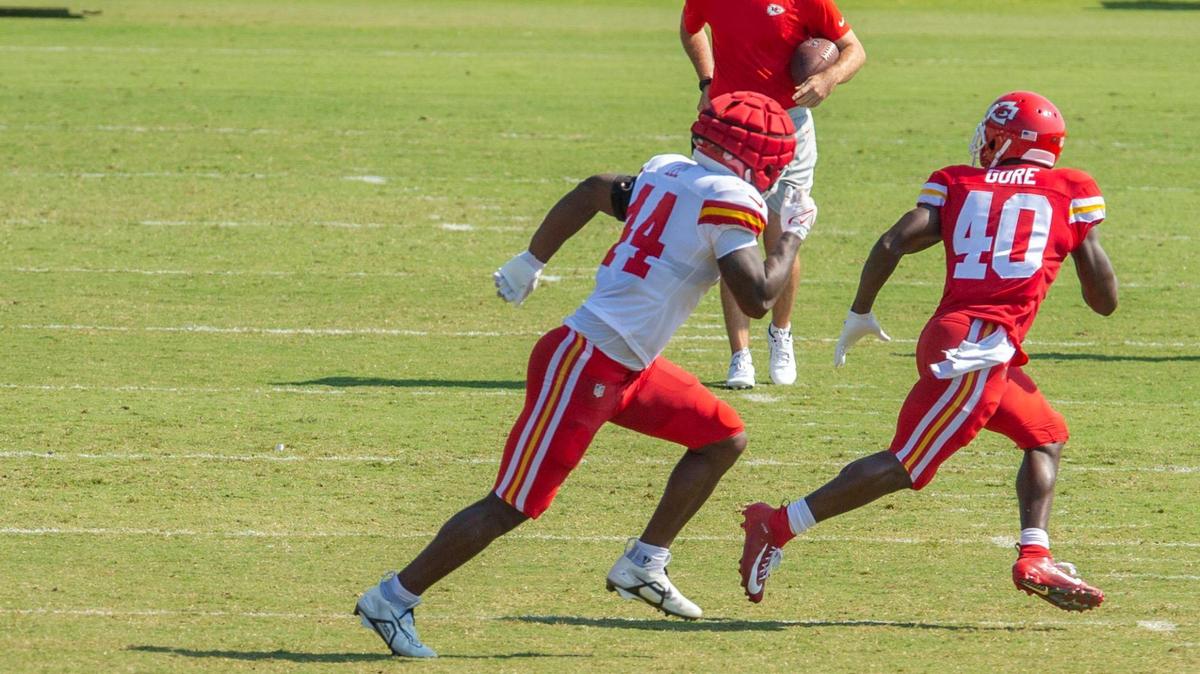 Kansas City Chiefs linebacker Elijah Lee (44) and running back Derrick Gore run a passing drill during practice at Chiefs training camp on Wednesday, Aug. 17, 2022, in St. Joseph.
