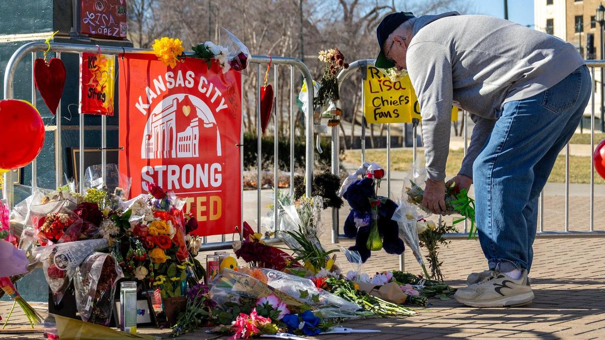 Gary Egger leaves flowers at a makeshift memorial for Lisa Lopez-Galvan at Union Station on Sunday, Feb. 18, 2024, in Kansas City. Lopez-Galvan was killed Wednesday at Union Station in a hail of gunfire following the Kansas City Chiefs Super Bowl LVIII victory parade.