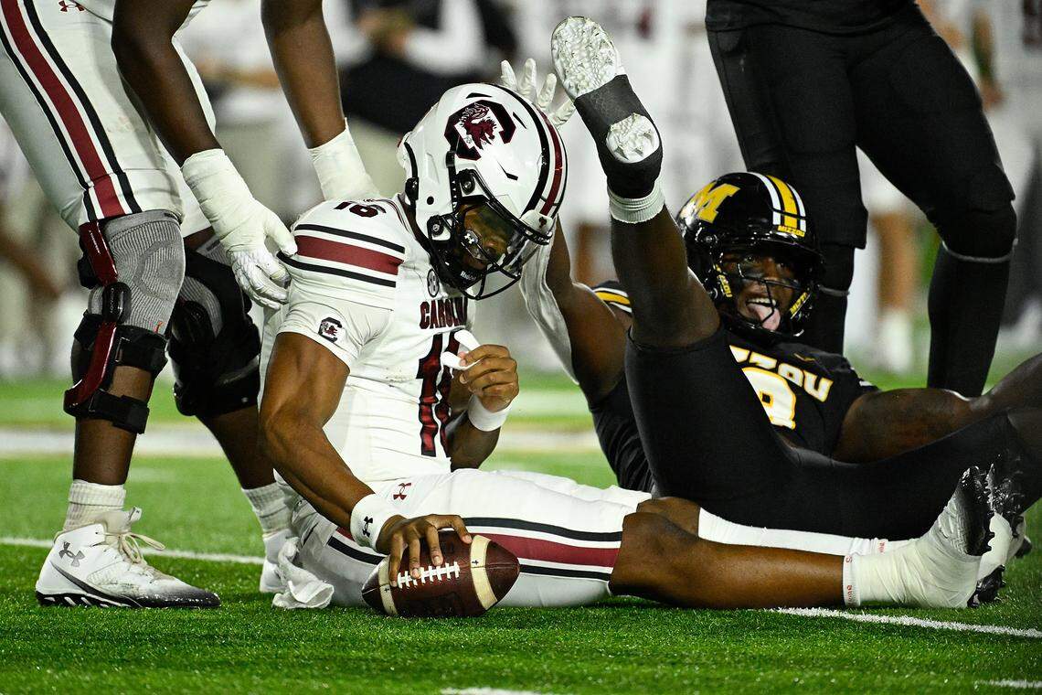 LaNorris Sellers #16 of the South Carolina Gamecocks looks on after being tackled by Zion Young #9 of the Missouri Tigers at Faurot Field at Memorial Stadium on September 20, 2025 in Columbia, Missouri.