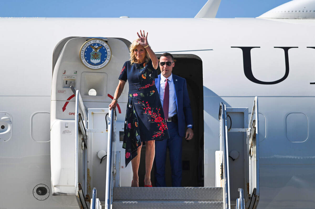 First lady Jill Biden waves as she exits her plane on Wednesday, Sept. 27, 2023, at the Charles B. Wheeler Downtown Airport in Kansas City. The first lady arrived in Kansas City to visit the Harry S. Truman Presidential Library and Museum.