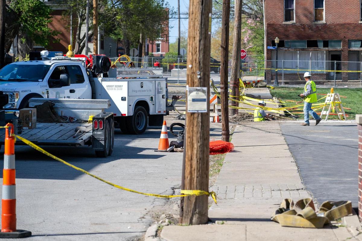 Liberty Utilities crews work to repair a gas line Tuesday in Lexington, Missouri. A gas explosion the week before killed a 5-year-old boy and severely injured his father and sister.