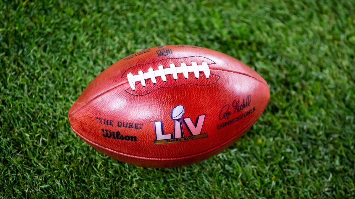 Detailed view of an official Wilson football on the field during the Tampa Bay Buccaneers game against the Kansas City Chiefs in Super Bowl LV at Raymond James Stadium.