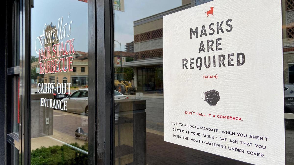 Fiorella’s Jack Stack Barbecue on the Country Club Plaza had a humorous mask requirement notice posted Thursday, Aug. 5, 2021. A mandatory mask order went into effect on Monday.