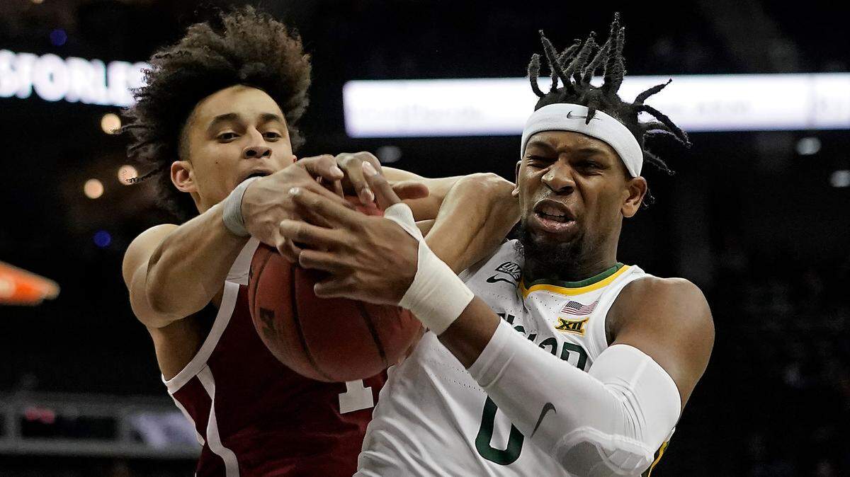 Baylor forward Flo Thamba, right, battles for a rebound against Oklahoma forward Jalen Hill in the Big 12 tournament. In nine NCAA Tournament appearances under coach Scott Drew, the Bears have advanced to the Sweet 16 or beyond five times.