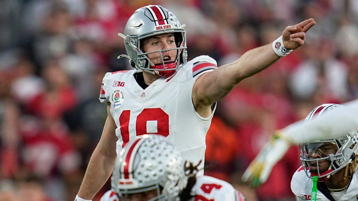 Ohio State Buckeyes quarterback Will Howard (18) motions during the second half of the College Football Playoff quarterfinal against the Oregon Ducks at the Rose Bowl in Pasadena, Calif. on Jan. 1, 2025. Ohio State won 41-21.