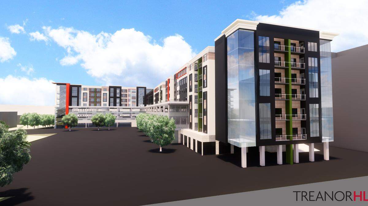 Developers plan to build a mixed-use project at 3600 Broadway, a decades-old shopping center that provides parking for the Uptown Theater but remains only 40 percent leased.