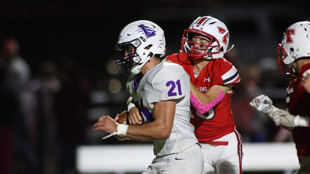 Ashton Moore and Louisburg notched a thrilling 30-29 high school football victory at Tonganoxie on Friday night.