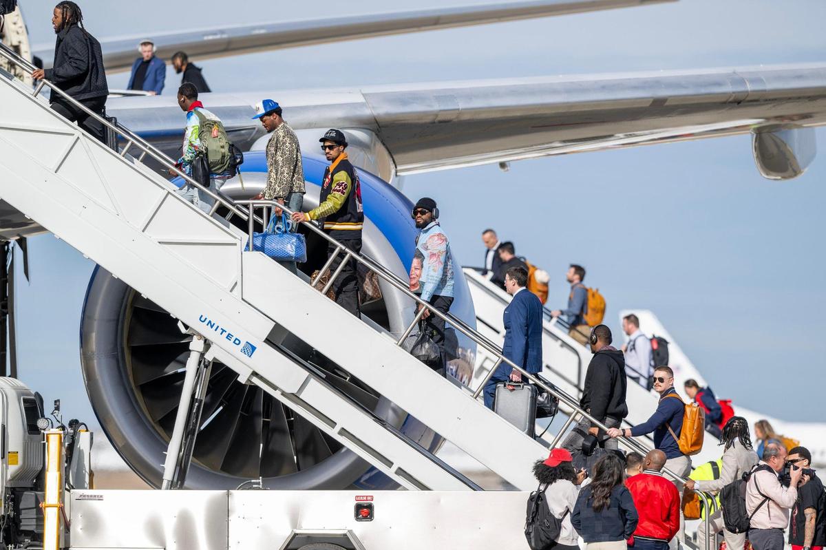 The Kansas City Chiefs board a United Airlines flight at Kansas City International Airport on Sunday, Feb. 2, 2025, traveling to New Orleans for Super Bowl LIX.