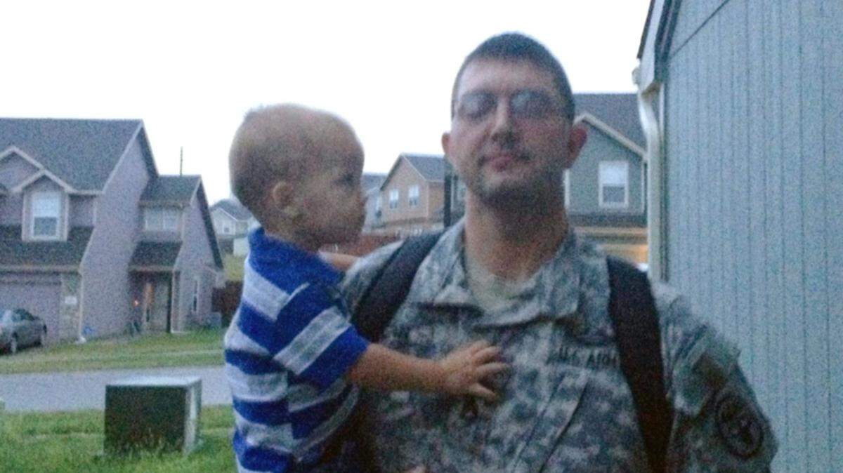 Christopher Lyman with his son Evan, shortly before he was arrested for the death of his nephew.