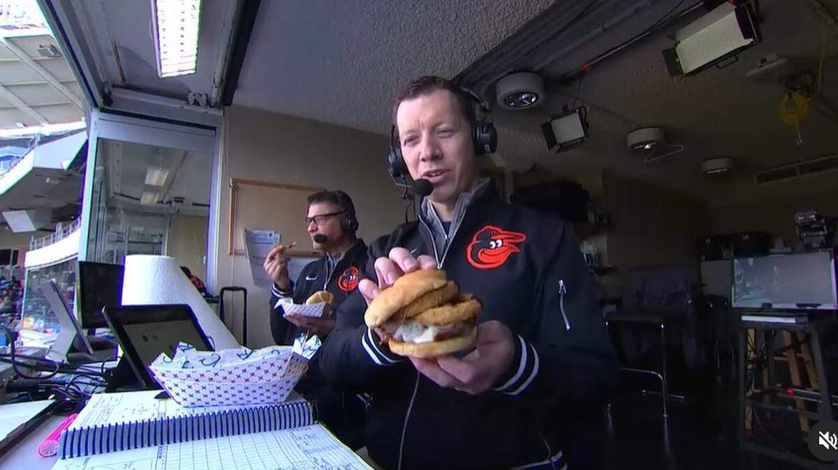 Orioles broadcaster Kevin Brown showed off the Z-Man he was prepared to eat at Kauffman Stadium.