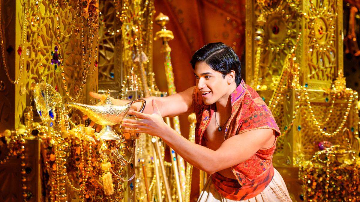 Aladdin (Adi Roy) finds some unusual treasure in the touring production of the Broadway musical “Aladdin,” coming to Kansas City this month.