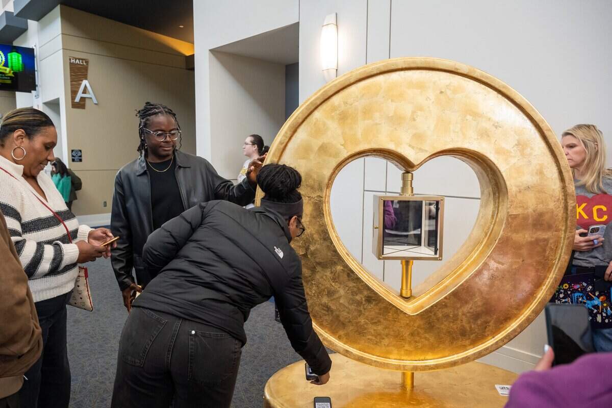 Thousands of people attend the first public exhibition of the new Parade of Hearts titled “150 United,” on Saturday, April 4, 2026, in Overland Park. The hearts will begin to be placed around the Kansas City metro area over the next few months.