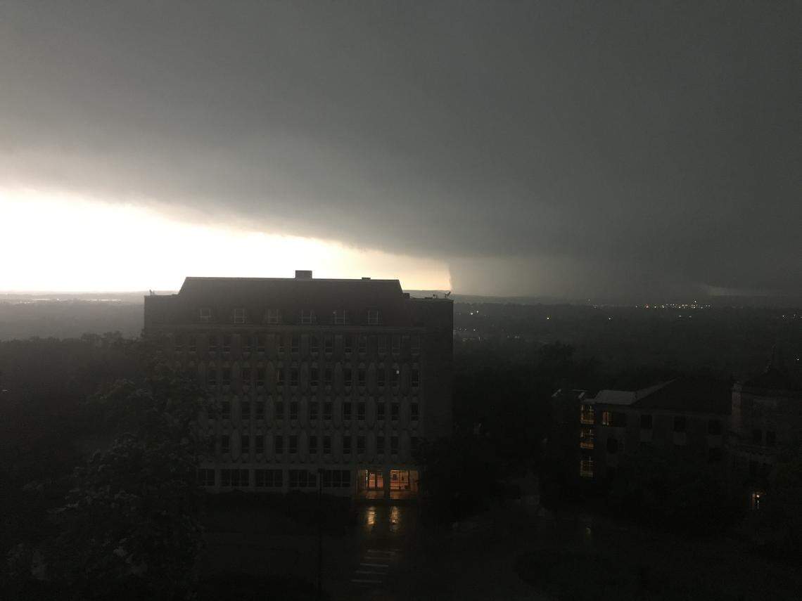 A photo taken at 6:16 p.m. looking south from the sixth floor of Fraser Hall on the University of Kansas campus shows the storm that hit the edge of the city. Blake Hall is in the foreground.