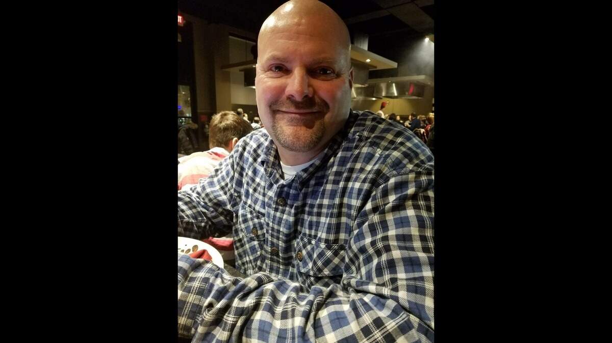 The 49-year-old Prescott city employee was trying to help a mom and infant when a box truck fatally crashed into the vehicles, sheriff said.