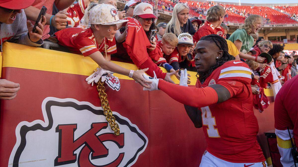 Kansas City Chiefs wide receiver Rashee Rice (4) greets fans as he leaves the field after scoring two touchdowns against the Las Vegas Raiders on Sunday, October 19, 2025, at GEHA Field at Arrowhead Stadium in Kansas City. The Chiefs defeated the Raiders, 31-0.