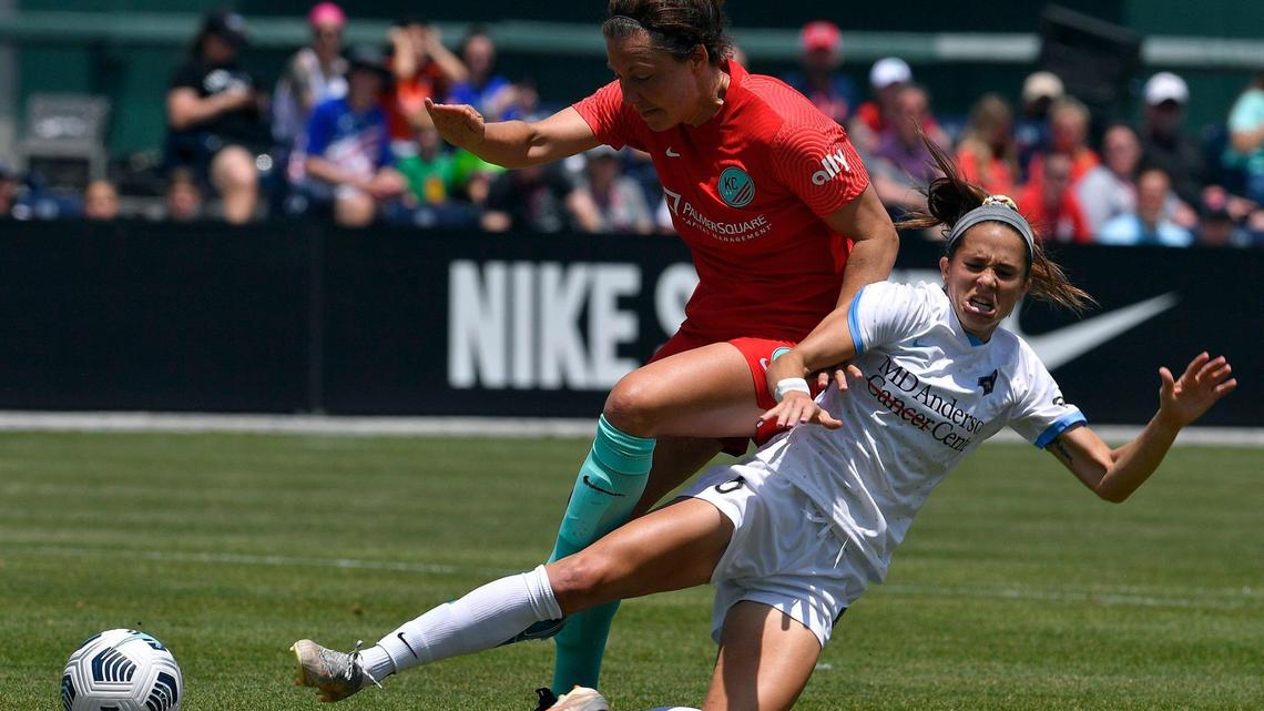 KC NWSL’s Rachel Corsie beats Houston’s Shea Groom to the ball during the first period of Sunday’s match at Legends Field in Kansas City.