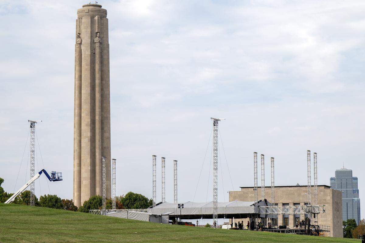 Event staffers set up a stage outside the National WWI Museum and Memorial on Tuesday, Sept. 30, 2025, in Kansas City, ahead of pop singer Chappell Roan's concert Visions of Damsels and Other Dangerous Things.