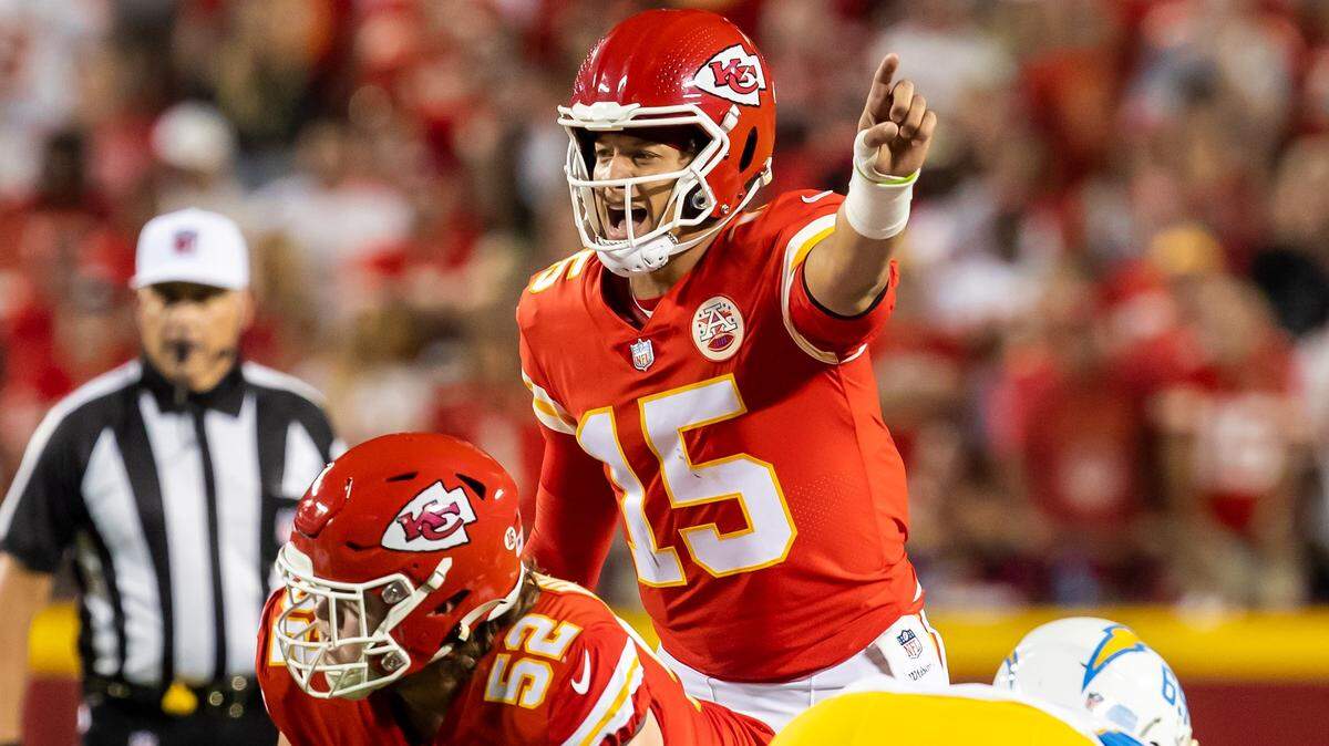 Chiefs quarterback Patrick Mahomes directs a play during Kansas City’s home opener against the L.A. Chargers on Thursday night at GEHA Field at Arrowhead Stadium.