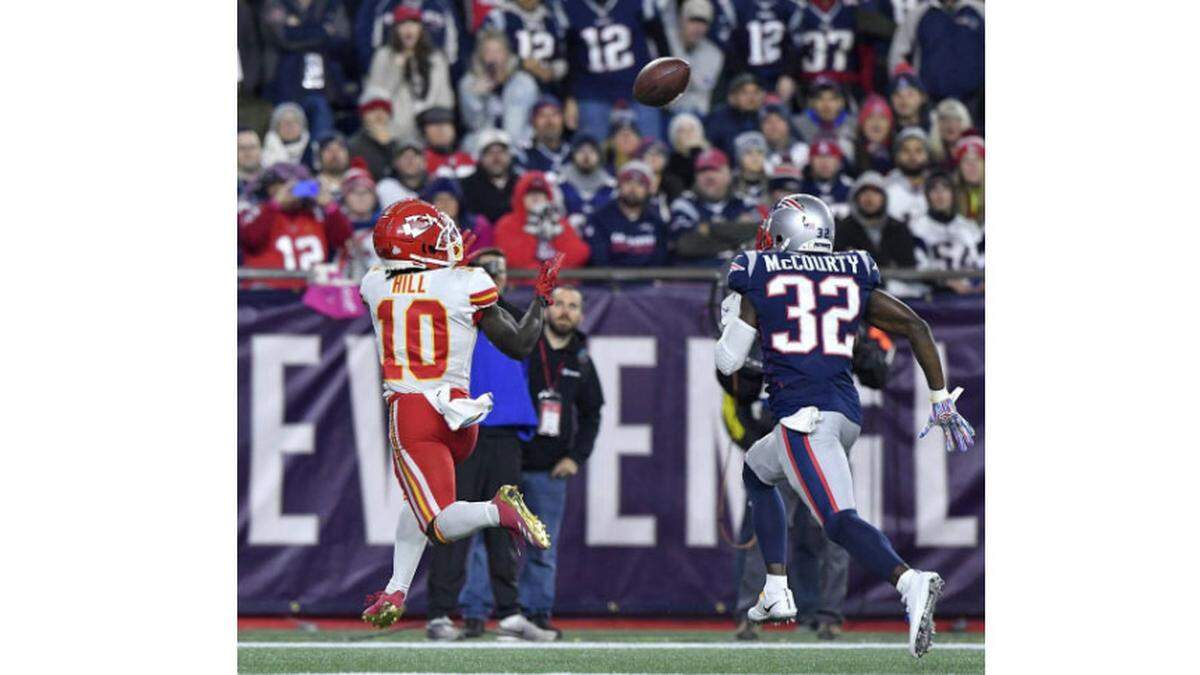 Kansas City Chiefs wide receiver Tyreek Hill caught a 14-yard pass from Patrick Mahomes in front of New England Patriots free safety Devin McCourty to score in the third quarter in Foxborough. It was Mahomes’ 16th touchdown pass of the 2018 regular season.