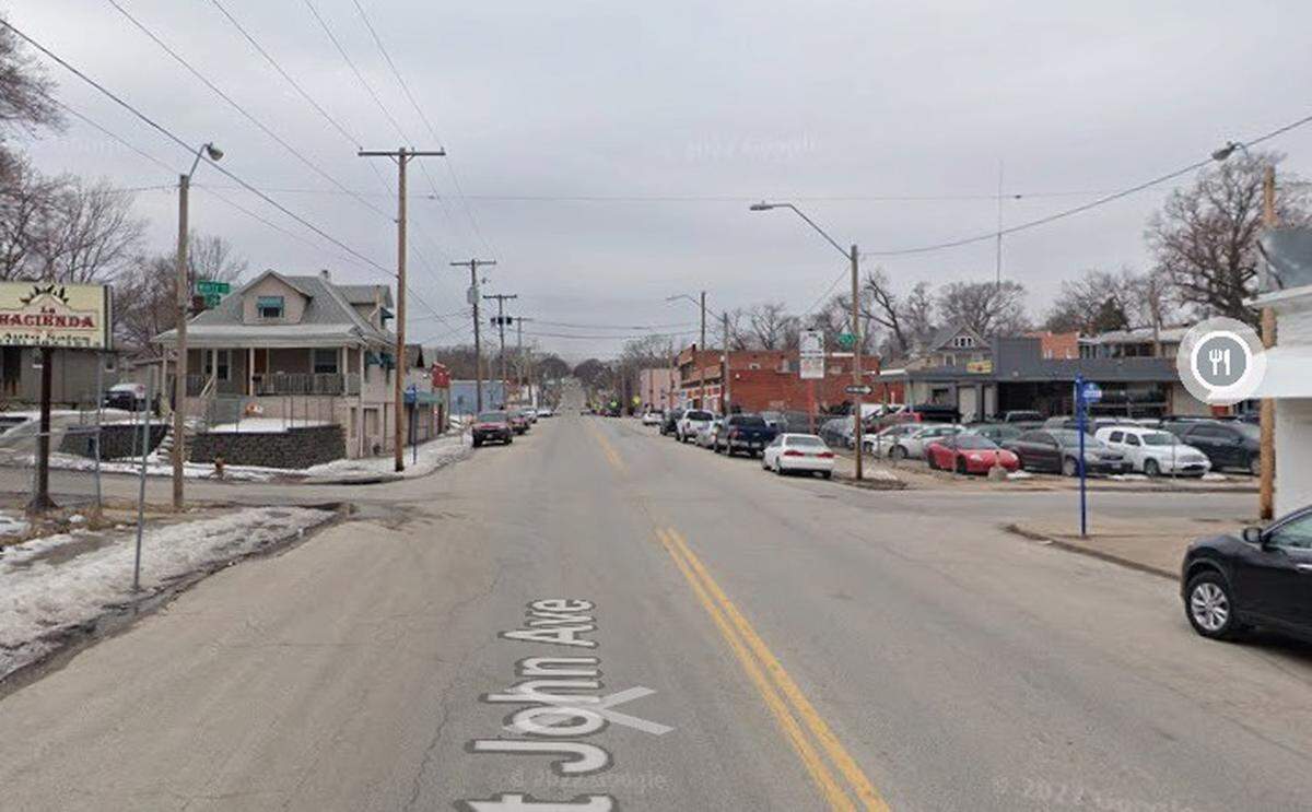 The intersection of St. John and White avenues in the Indian Mound area of Kansas City is seen in a Google Maps street view image.