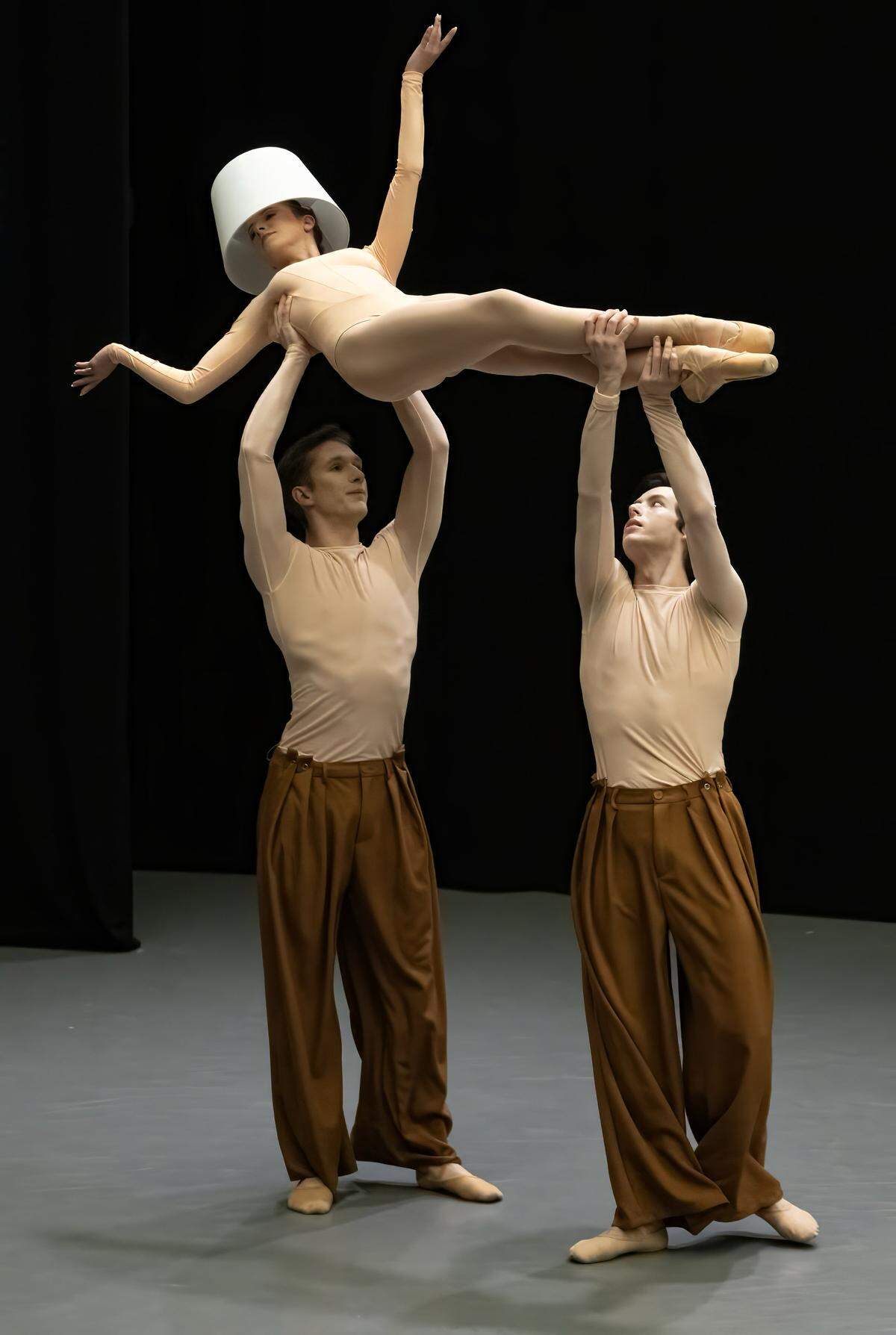 Dancers from the second company, Brooke Noska, Troy Monger-Levin and Owen Watson performs in “Spark,” during the dress rehearsal for the Kansas City Ballet's production “New Moves,” at the Frost Studio Theater at the Bolender Center on Wednesday, Jan. 27, 2026, in Kansas City.