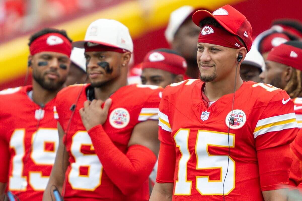 Kansas City Chiefs quarterback Patrick Mahomes (15) stands on the sideline during the first half of the Chiefs preseason game against the Los Angeles Rams, on Saturday, August 15, 2026, at Arrowhead Stadium.