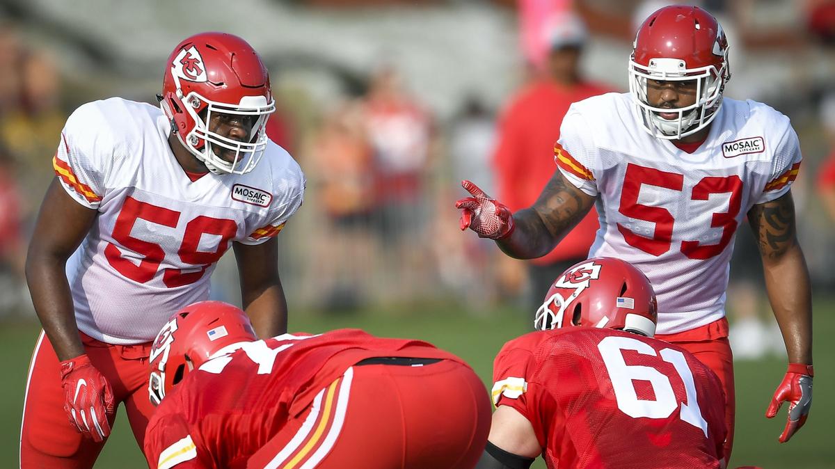 Chiefs linebacker Reggie Ragland (59) listened to teammate Anthony Hitchens (53) as they lined up before a play during a recent training-camp practice at Missouri Western in St. Joe.